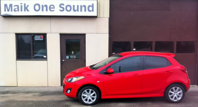2013 Mazda 2 with professional window tint in North Bay